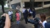 Lawyers for the Texas Civil Rights Project talk with reporters outside the McAllen, Texas, courthouse where no parents were being criminally prosecuted, June 22, 2018. 