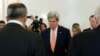 Russian Foreign Minister Sergei Lavrov (L) and U.S. Secretary of State John Kerry (C) observe a moment of silence for the attack victims of Nice during a meeting in Moscow, Russia, July 15, 2016.
