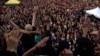 People gather at Republique plaza in a protest against the far right on July 3, 2024, in Paris. France will deploy 30,000 police across the country late Sunday following parliamentary elections. The campaign has been marked by growing violence.
