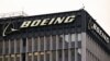 FILE - The Boeing Co. logo is displayed outside of company offices near Los Angeles International Airport (LAX) in El Segundo, California, Jan. 18, 2024. New CEO Kelly Ortberg laid out his plan to turn Boeing around after years of heavy losses and damage to its reputation.  