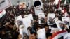 Supporters of Shi'ite cleric Moqtada al-Sadr protest against the execution of Shi'ite Muslim cleric Nimr al-Nimr in Saudi Arabia, during a demonstration in Baghdad Jan. 4, 2016.