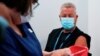 The Pfizer COVID-19 vaccine is prepared for a high-risk worker in Melbourne, May 12, 2021.