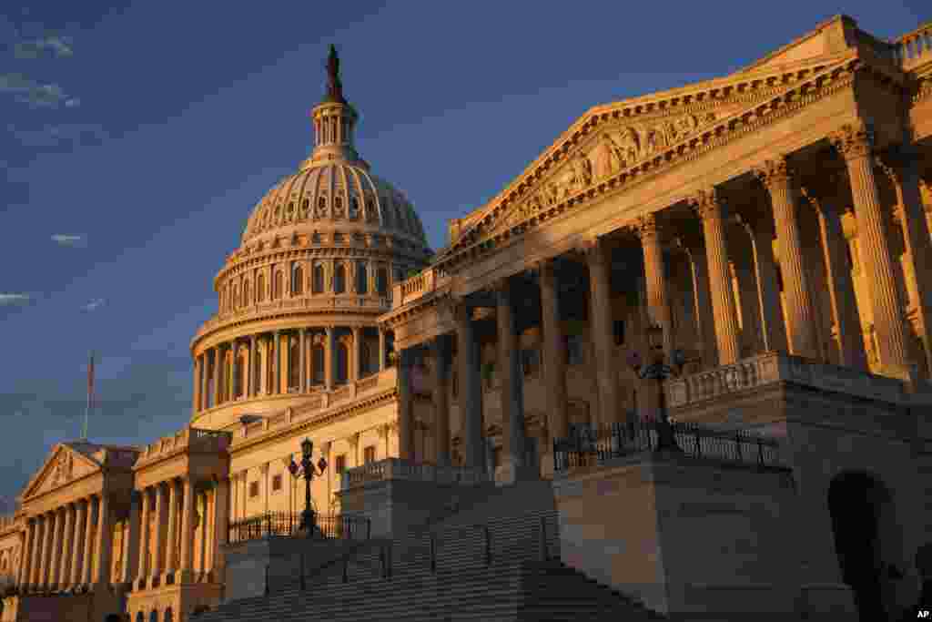 The morning sun illuminates the U.S. Capitol in Washington D.C. as the government teeters on the brink of a partial shutdown at midnight unless Congress can reach an agreement on funding. 