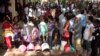 FILE PHOTO - Cambodian residents line up to vote in local elections at a polling station in Chak Angre Leu on the outskirts of Phnom Penh, Cambodia, Sunday, June 4, 2017. 