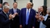Članovi Nacionalnog komiteta senatskih republikanaca aplaudiraju Trumpu, 13. juni 2024. (REUTERS/Evelyn Hockstein)
