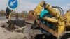 Tufarqanda avtomobilləri sel yatağına yönləndirən yol lövhəsi götürülüb