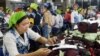 FILE PHOTO - Cambodian garment workers work inside a factory in Phnom Penh, Cambodia. 