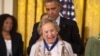FILE - Then-President Barack Obama awards Ethel Kennedy the Presidential Medal of Freedom during a ceremony in the East Room of the White House in Washington, Nov. 24, 2014.