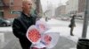 File -- John Wickersham bunches of roses he bought on New York's Upper West Side on Valentine's Day.
