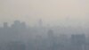Air pollution blankets the skyline in Tehran, Iran, Nov. 30, 2019. 