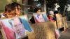 Long Kimheang, the wife of alleged an RT documentary about sex trafficking in Cambodia, along with other protestors sat outside the Russian Embassy in Phnom Penh, Cambodia, February 4, 2019. 