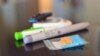 A blood sugare analyser and an insulin syringe are seen on a table, Nov. 13, 2019. (Photo: Diaa Bekheet)