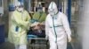 Le coronavirus franchit la barre des 1.000 morts en Chine